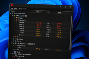 HWMonitor showing CPU temperature readings and alerts